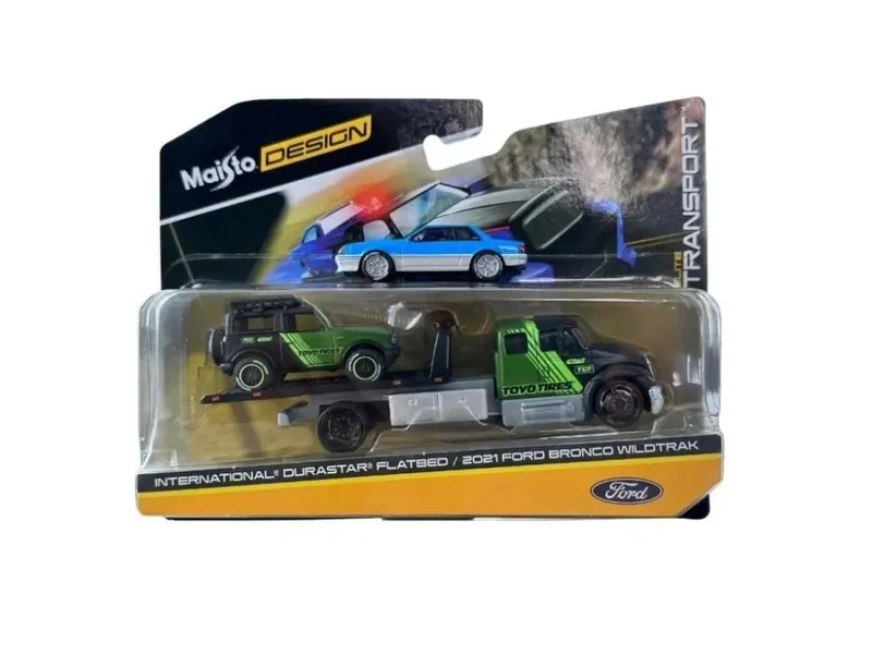 MAISTO DESIGN ELITE TRANSPORT SET CAMION CU RAMPA INTERNATIONAL DURASTAR FLATBED SI MASINUTA FORD BRONCO WILDTRAK 2021 SCARA 1 LA 64